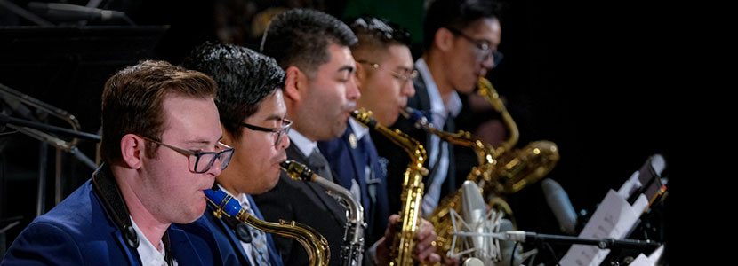 students playing saxophones
